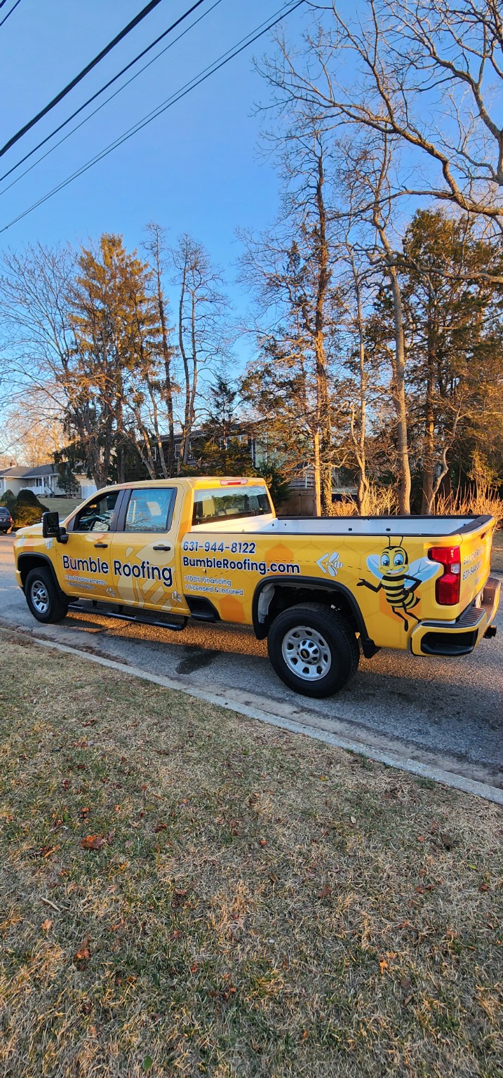 Bumble Roofing yellow truck wrap